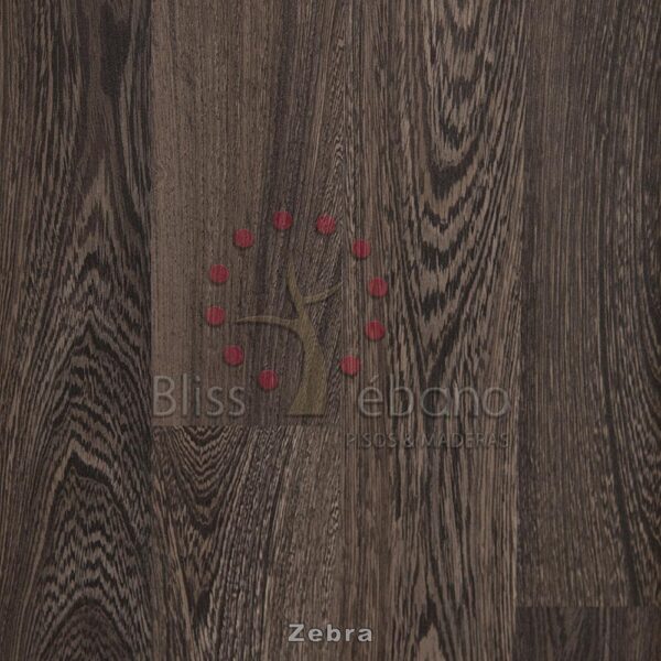 Superficie de madera con un patrón de vetas de rayas de cebra y un pequeño arreglo de cuentas rojas que forman un diseño parecido a un árbol, incluido el texto "bliss Piso Laminado Zebra".