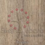 Superficie de madera con Piso de PVC Tundra rodeado de puntos rojos formando un bucle.